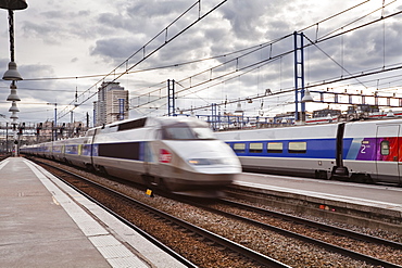 A high speed TGV train arrives at Gare Montparnasse in Paris, France, Europe