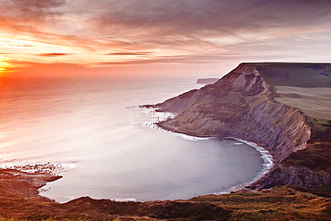 A beautiful sunset over Chapman's Pool on Dorset's Jurassic Coast, UNESCO World Heritage Site, Dorset, England, United Kingdom, Europe