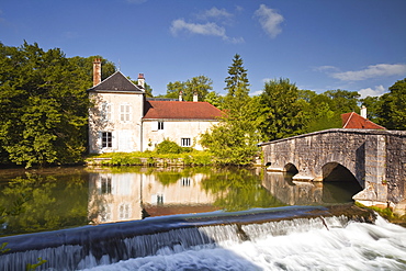 La Laignes river flowing through the village of Les Riceys, Aube, Champagne-Ardennes, France, Europe 