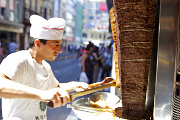 Chef cutting meat for kebab, Istanbul, Turkey, Eurasia