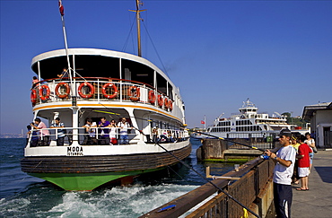 Ferry and fisherman on the Bosphorus, Istanbul, Turkey, Europe, Eurasia