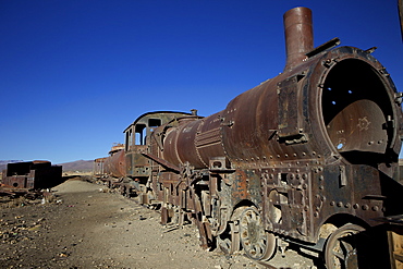 Rusting locomotive at train graveyard, Uyuni, Bolivia, South America