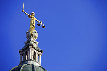 Scales of Justice above the Old Bailey Law Courts (Central Criminal Court) on former site of Newgate Prison, London, England, United Kingdom, Europe 