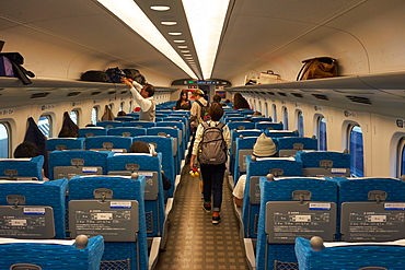 Passengers on a bullet train in Japan, Asia