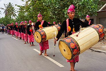 Drummers leading a traditional Sasak wedding procession, Lombok, Indonesia, Southeast Asia, Asia