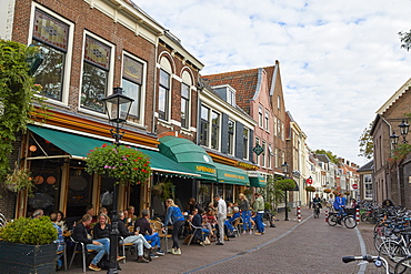 People sitting outside Springhaver Theater in Utrecht, North Holland, The Netherlands, Europe