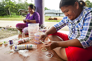 Women producing traditional backpack - Borneo Indonesia