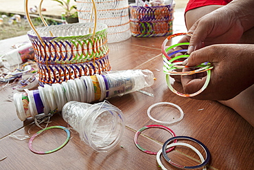 Woman producing traditional backpack - Borneo Indonesia