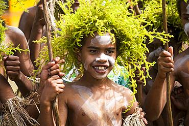 Portrait of young dancer with fern crown, cultural festival. Common Poya. New Caledonia.