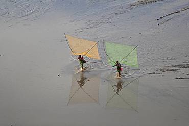 Fishermen on foot, shrimp fishing with net, Xiapu County, Fujiang Province, China