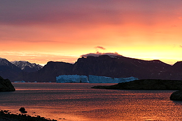 Sunrise on the bottom of Scoresby Sund from the northernmost island of the Bear Archipelago, Greenland