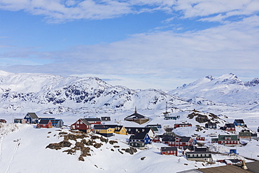 The small village of Tasiilaq during winter it can only be reached with helicopter, East Greenland