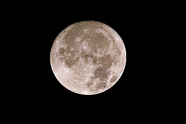 International Space Station passing by the moon.