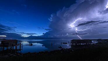 Thunderstorm over the Po Delta, Shot facing a lagoon in the Po Delta, during thunderstorms on September 08, 2019, Emilia Romagna, Veneto, Italy