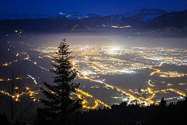 Light and air pollution over the Arve valley shortly before dusk. Shot of January 22, 2020 from the slopes of Mont M?le, Haute-Savoie, France