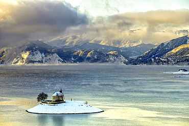 Saint Michael's chapel in winter, Lac de Serre Poncon, Hautes Alpes, France