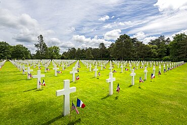 White marble cross where American soldiers are buried, first American military cemetery of World War II, Colleville-sur-Mer, Calvados, Normandy, France