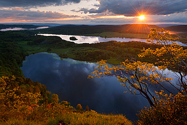 Sunset on the Grand Maclu and Ilay lakes in late spring, Jura, France