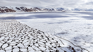 Fast ice breaking up, Svalbard, Arctic