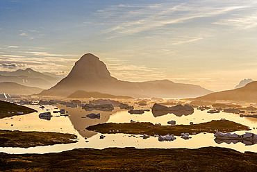 Midnight sun. Landscape, on the Drygalski Peninsula, with icebergs in the Uummannaq Fjord System in the northwest of Greenland, north of the polar circle. north america, Greenland, danish territory, summer