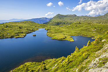 Lac Fourchu (2053 m) seen from the GR 50 hiking trail, Taillefer massif, Matheysine, Oisans, Isere, France