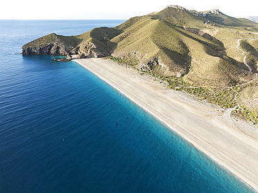 The Playa de los Muertos (beach of the dead). Aerial view. Drone shot. Nature Reserve Cabo de Gata-Nijar, Almería province, Andalusia, Spain.