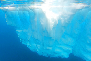 Underwater view of an iceberg. Cruise on board Exploris One. Antarctic.