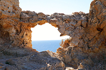 Natural arch on the island of Les Embiez, Mediterranean Sea, France