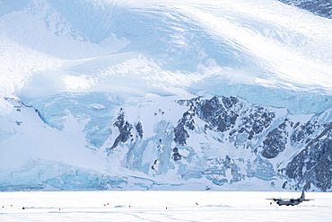 The Lockheed C-130 Hercules prepares to take off from the runway built on the sea ice in Terra Nova Bay, where the Mario Zucchelli station is located. Victoria Land, Antarctica