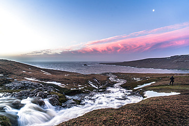 Unforgettable sunset near the Baie Charrier hut. Courbet Peninsula, Kerguelen archipelago.
