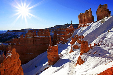 Bryce Canyon National Park hoodoos hoodoo rock stone pillars spire of rock formed by weathering in snow winter erosion sun United States United States of America North America America