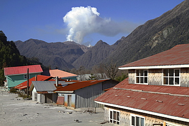 a lahar destroyed houses parts of the town of Chaiten in the backgroun the lava dome of the volcano South Chile Chile South America America Chile South America America