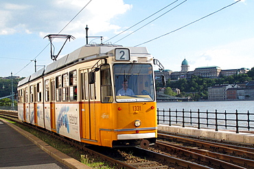 tram and castle in the background Budapest Hungary