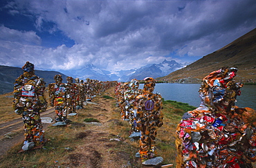 Switzerland Lake Stelli art sculptures human figures built out of trash by artist HA Schult