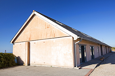 The largest rammed earth building in the UK, a low impact building technique at Mount Pleasant Ecological Park, Porthtowan, Cornwall, UK.