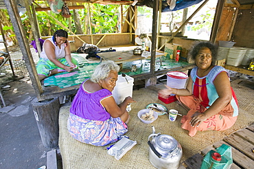 Tuvaluan family having breakfast on Funafuti Atoll, Tuvalu, Pacific