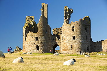 Dunstanburgh castle on Northumberlands coast near Craster.