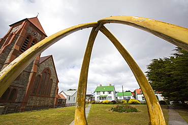 The Christian, Christ Church Cathedral in Port Stanley, the capital of the Falkland Islands, the most southerly cathedral in the world, with a whale bone arch from Blue whale lower jaw bones.