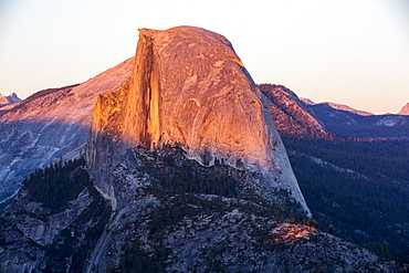 Half Dome at dusk from Glacier Point above Yosemite Valley, California, USA.