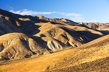 Badland scenery in Death Valley which is the lowest, hottest, driest place in the USA, with an average annual rainfall of around 2 inches, some years it does not receive any rain at all.