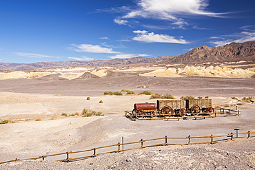 An old wagon train at the Harmony Borax works in Death Valley which is the lowest, hottest, driest place in the USA, with an average annual rainfall of around 2 inches, some years it does not receive any rain at all.