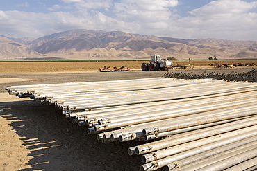 Irrigation pipes in California's Central Valley, which is in the grip of a four year long drought. The catastrophic drought means that no crops will grow without increasingly scarce irrigation water. Many areas of farmland have been abandoned due to the drought.