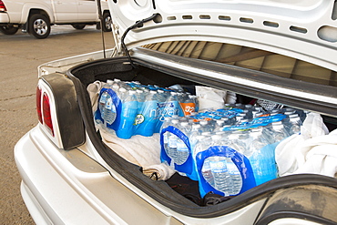 A water charity in Porterville supplying bottled water to houses who have had no running water for over five months, near Bakersfield, California, USA. Hoses in the East of Porterville, many of which are on private wells, have run completely out of water as the water table has dropped catastrophically. Following an unprecedented four year long drought, Bakersfield is now the driest city in the USA. Most of California is in exceptional drought, the highest level of drought classification. 428,000 acres of agricultural land have been taken out of production due to lack of water, thousands of agricultural workers have lost their jobs and one third of all children in California go to bed hungry.