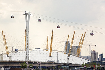 The O2 Arena and the Emirates air line cable car on the Royal Victoria Dock, London, UK.