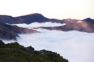 Helvellyn from Red Screes in the Lake District, Cumbria, UK, with valley cloud caused by a temperature inversion.