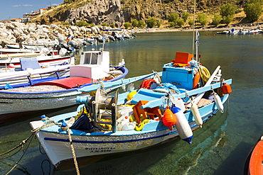 Traditional Greek wooden fishing boats in the harbour at Skala Eresou on Lesvos, Greece.