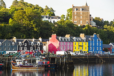 The iconic promenade of Tobermory on the Isle of Mull, Scotland, UK, with its colouful painted shops.