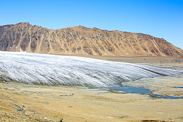 A glacier at Recherchefjorden on Western Svalbard with moraine showing the massive rate of retreat in the last 100 years.. All of Svalbards glaciers are retreating, even in the north of the archiapelago despite only being around 600 miles from the North Pole.