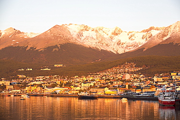 Sunrise over the town of Ushuaia which is the capital of Tierra del Fuego, in Argentina, it is the most southerly city in the world and the starting point for trips to Antarctica.