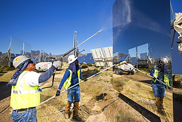 Workers washing the heliostats to maximise reflective power at the Ivanpah Solar Thermal Power Plant in California''s Mojave Desert is currently the largest solar thermal plant in the world. It generates 392 megawatts (MW) and deploys 173,500 heliostats that reflect the suns rays onto three solar towers. It covers 4,000 acres of desert.